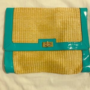 H&M straw clutch. Latched with inside zipper